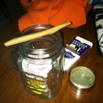 rolled blunt on the stash jar