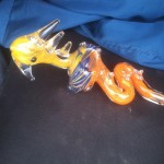 dinosaur marijuana pipe blue orange yellow