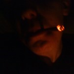 smoking a blunt on the porch in the dark